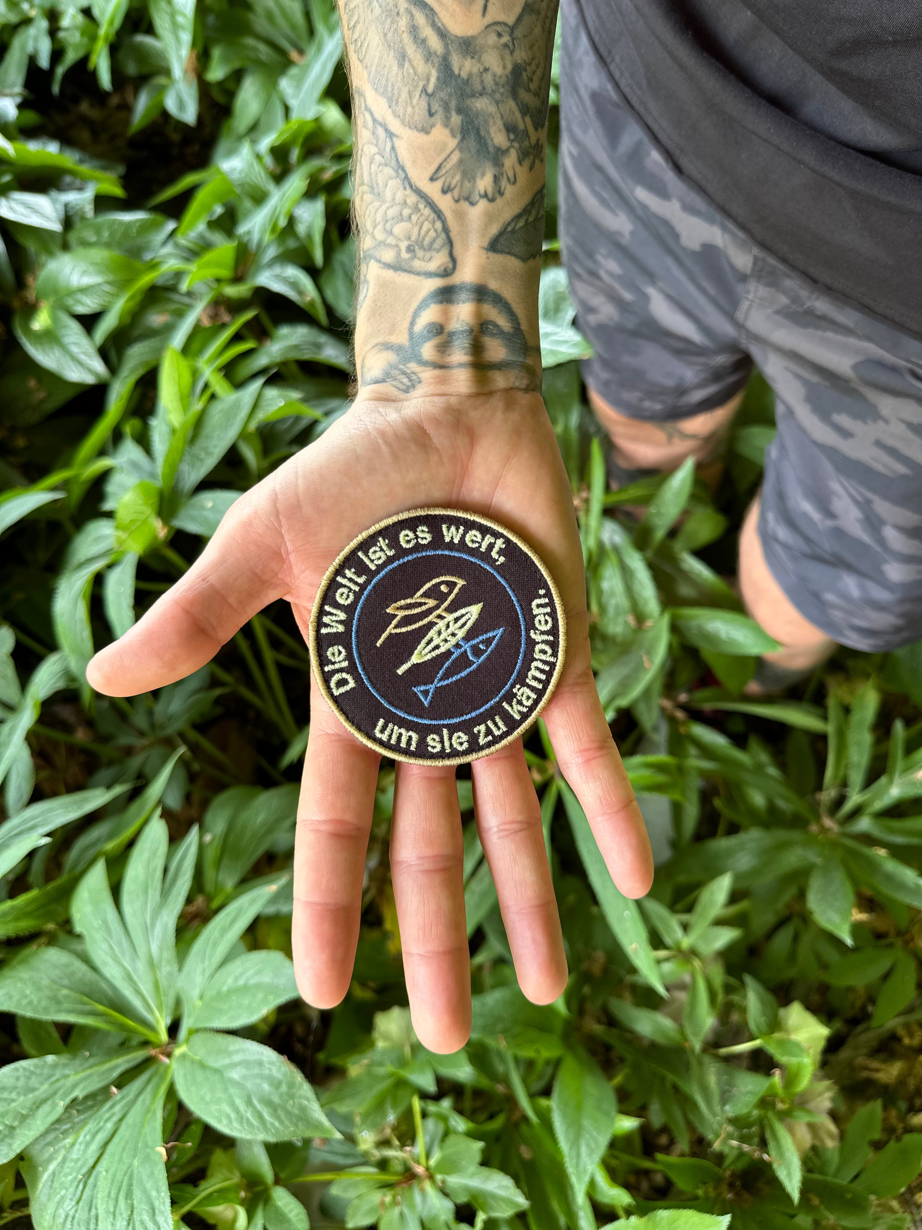 Patch "Die Welt ist es wert, um sie zu kämpfen" Original-Farbvariante