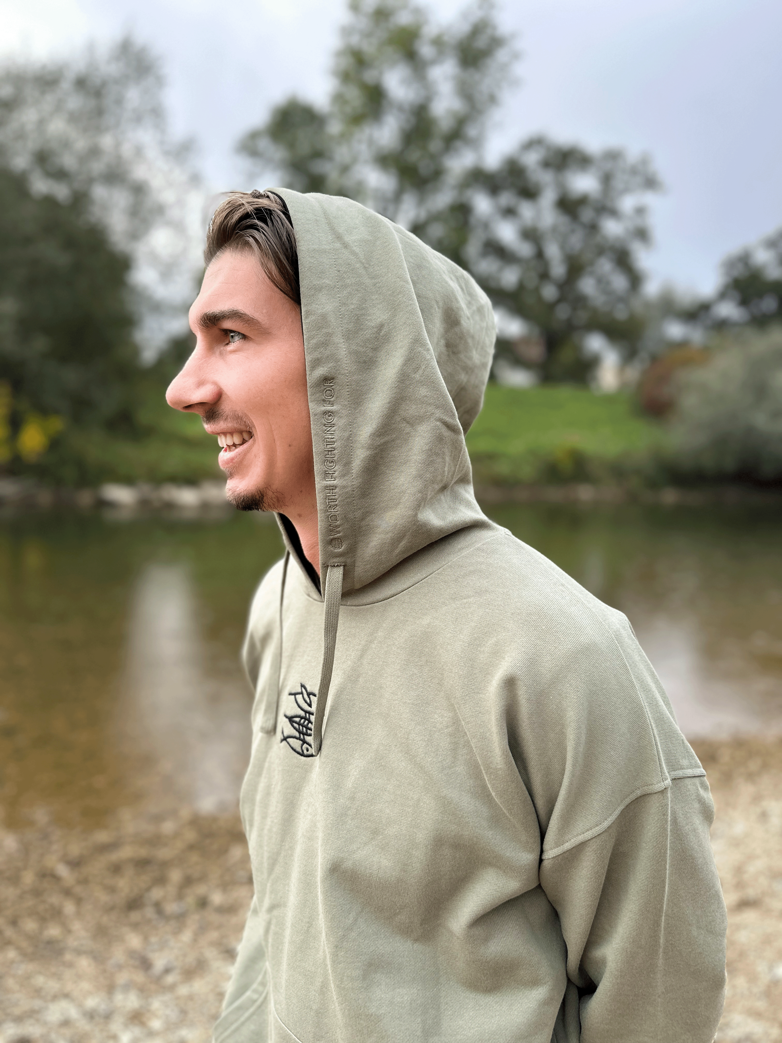 Unisex Hoodie "Mission Erde" oliv